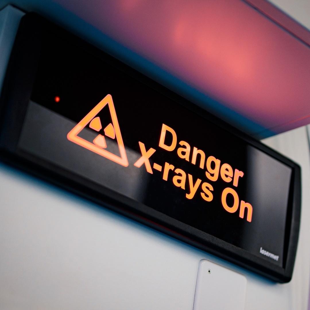 Sign that says "Danger X-rays On" and a symbol for x-rays.